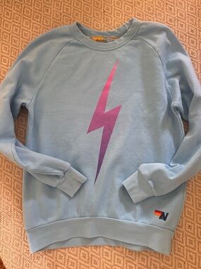 Aviator Nation Light Blue Sweatshirt with Pink Lightning Bolt